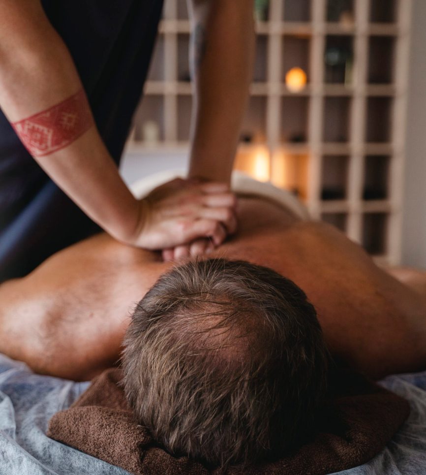 side-view-man-massaging-patient-scaled.jpg
